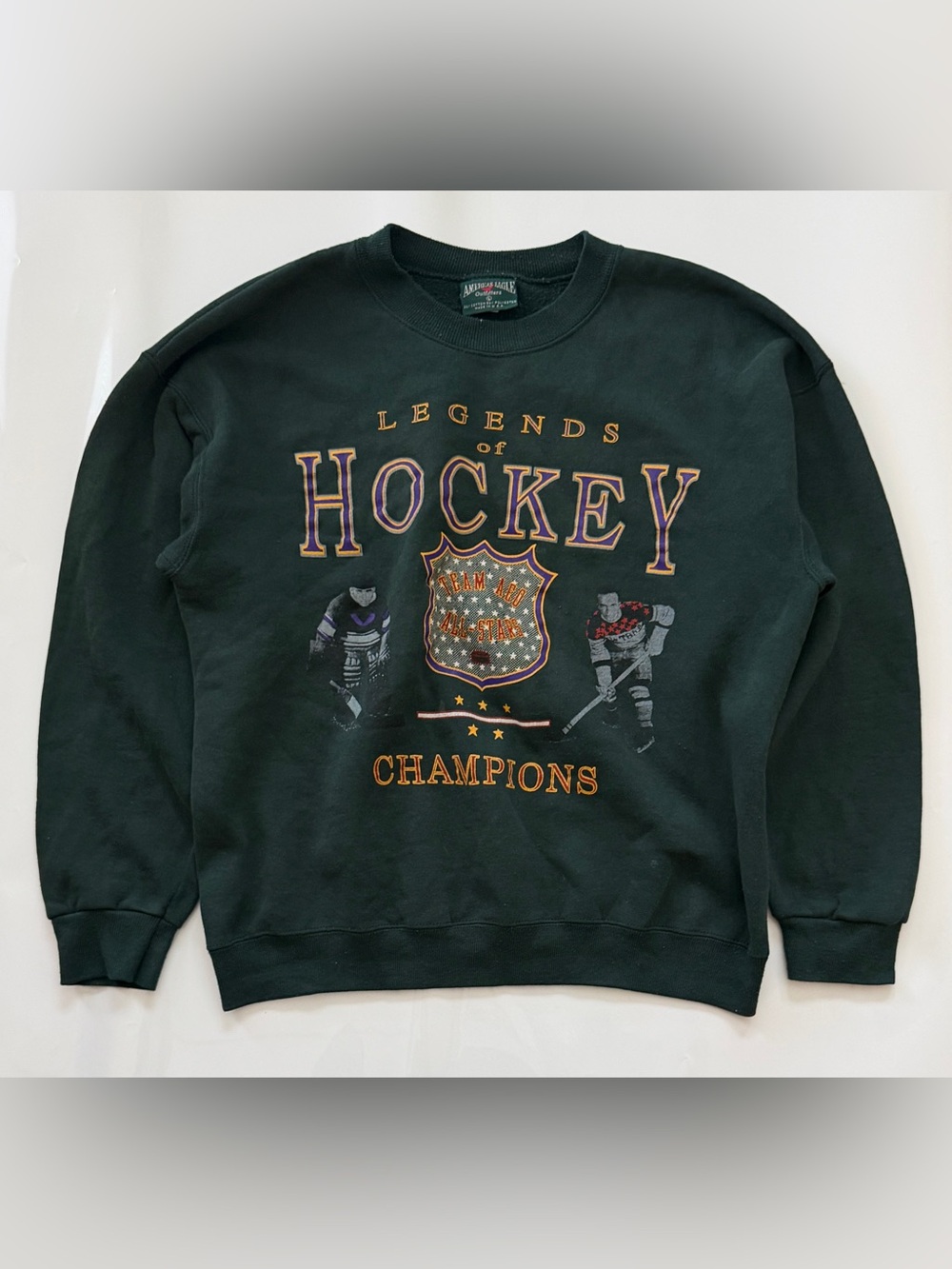 The Vintage 90's Made In USA American Eagle Legends of Hockey Sweatshirt is a cl